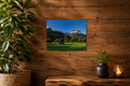 Wohnraum mit Holzwand und Premium matt Poster aus dem Werdenfelser Land mit Blick auf die Waxensteine, warme Naturfarben- Christina Bauer Photos